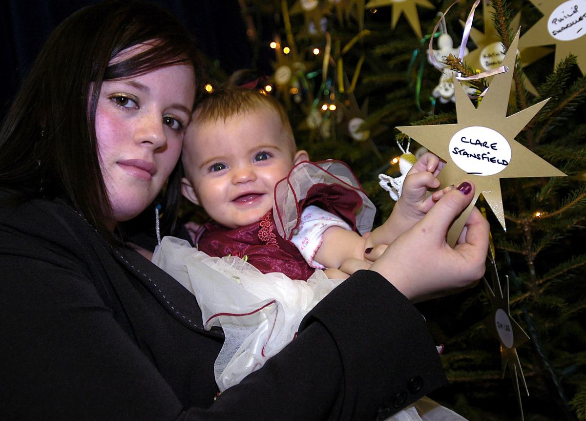 Mum Natalie Moorhouse with eight-month-old Lloretta-Clare Moorhouse and their star dedicated to great-grandma Clare Stansfield