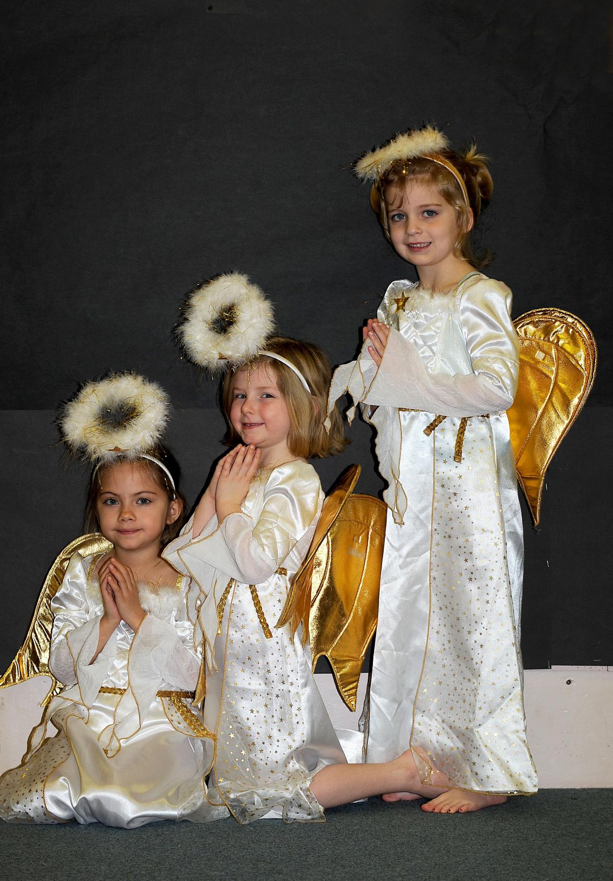 The angels in St Francis Catholic Primary School's production of Little Angels are, from the left, Amy Alinson, Aimee Gartlan and Isobel Shaw-Earney