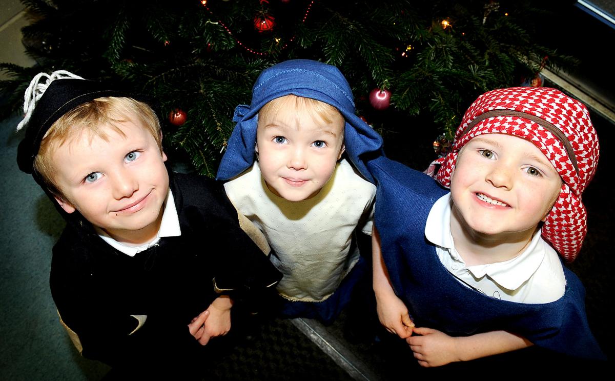 Appearing in Wilsden Primary School's Christmas production are, from the left, Finlay McGurk (Donkey), Emily Hodgson (Mary) and Jack Thomas (Joseph)
