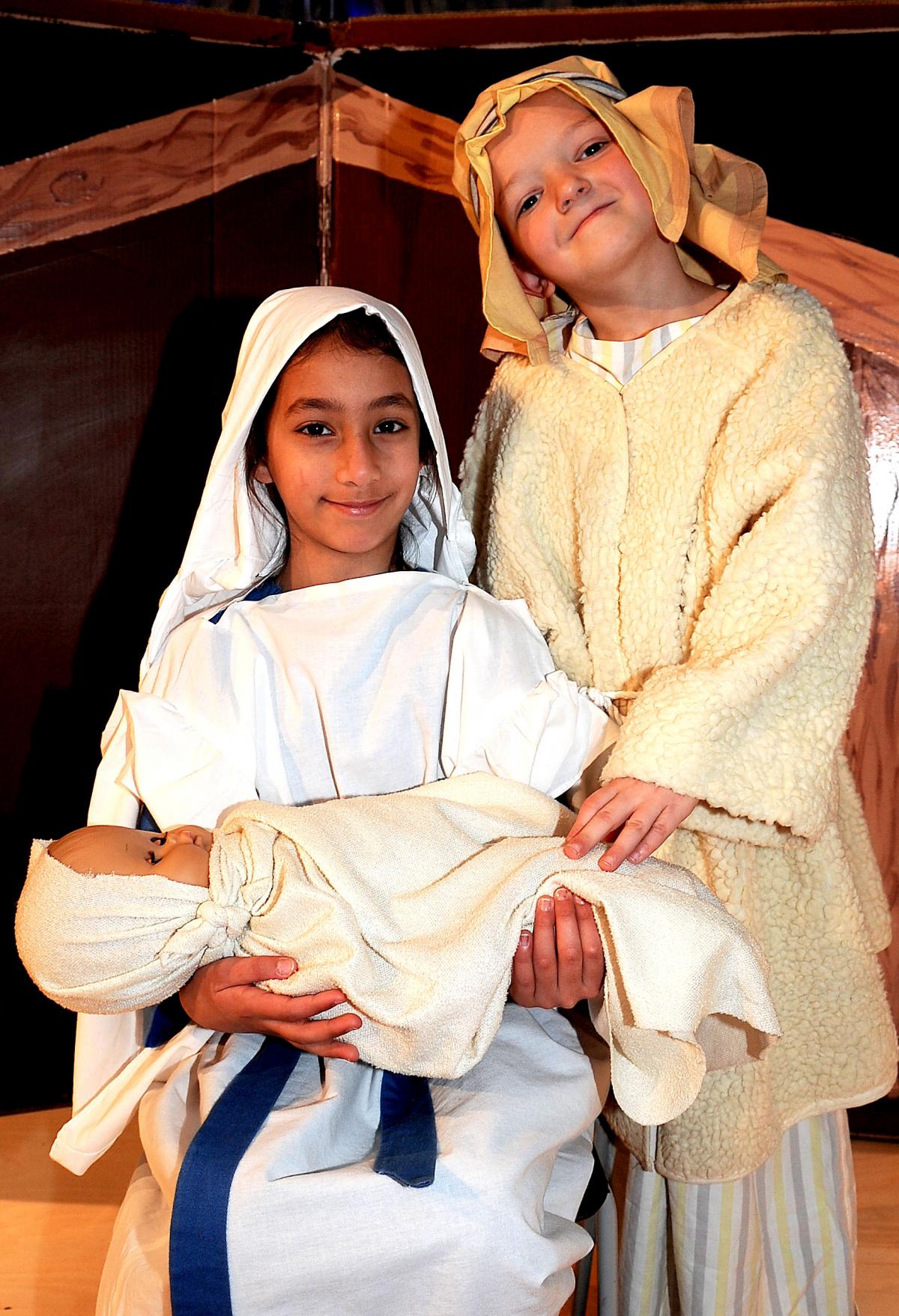 Maimoomah Mahbood and Keiran Bland as mary and Joseph in Lower Fields Primary School's Christmas production