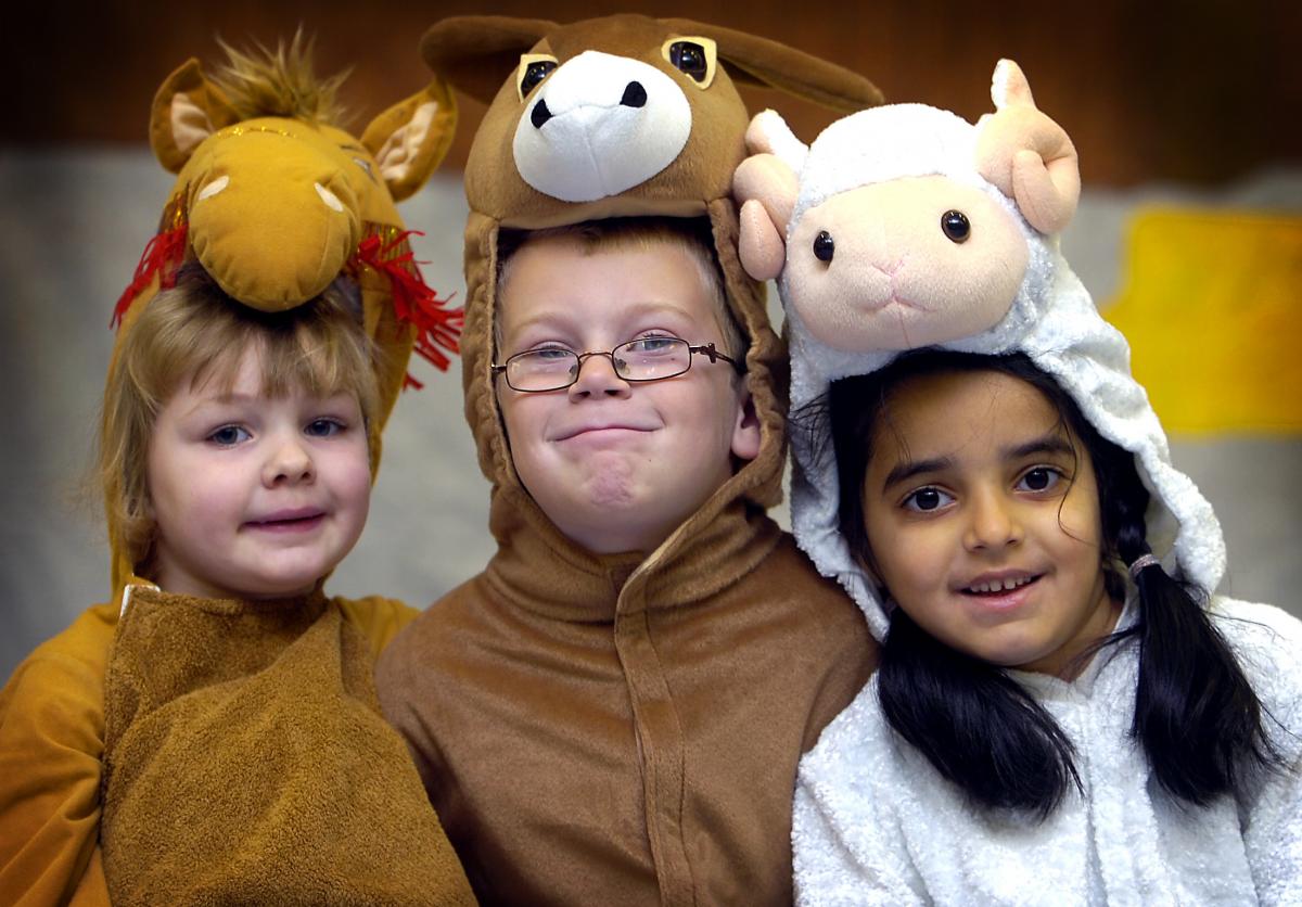 Taking part in St James' CE Primary School Nativity were, from the left, Katrina Row, Flynn Nash and Amardeep Kaur