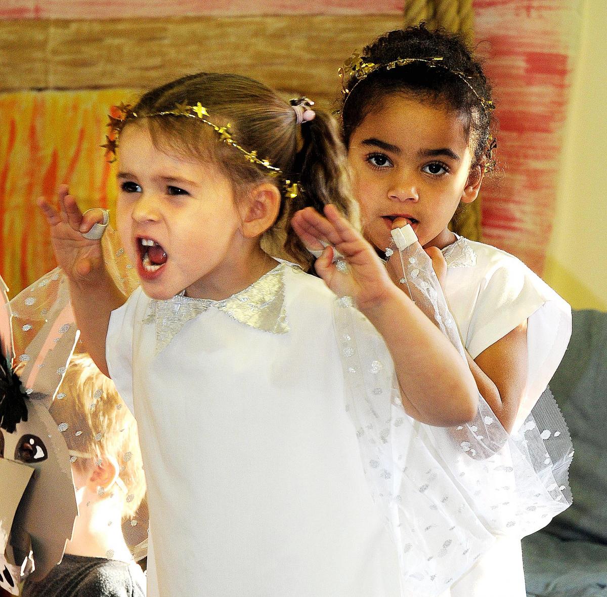 Appearing as Angel Delights in Menston Primary School Nativity 'The Little Owl and the Star' were April Lever, left, and Lily Cook