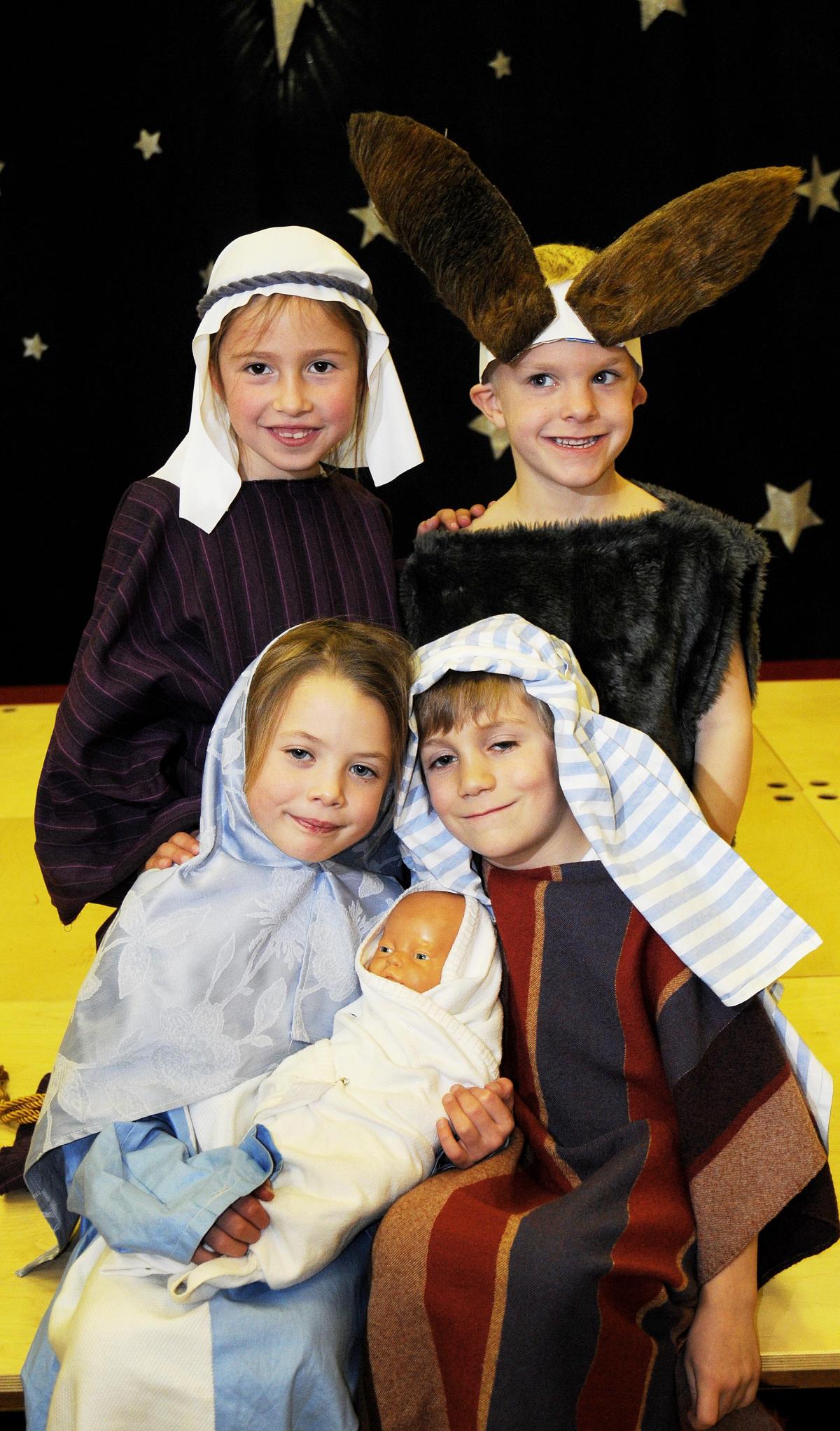 Mia Beck (Mary), Peter Monaghan (Joseph), Imogen Sunman (Shepherd), Kian Todd (Donkey) in Ilkley Sacred Heart Catholic Primary School Nativity