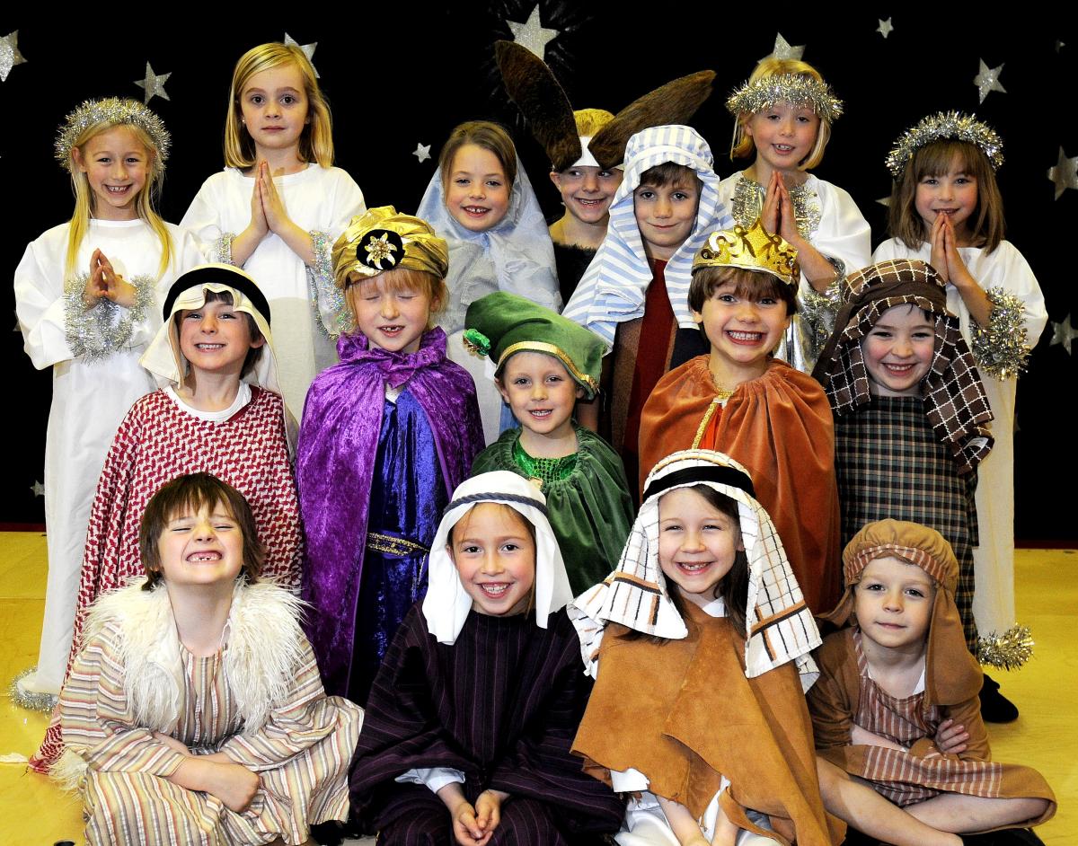 The cast of Ilkley Sacred Heart Catholic Primary School Nativity with Mia Beck as Mary and Peter Monaghan as Joseph