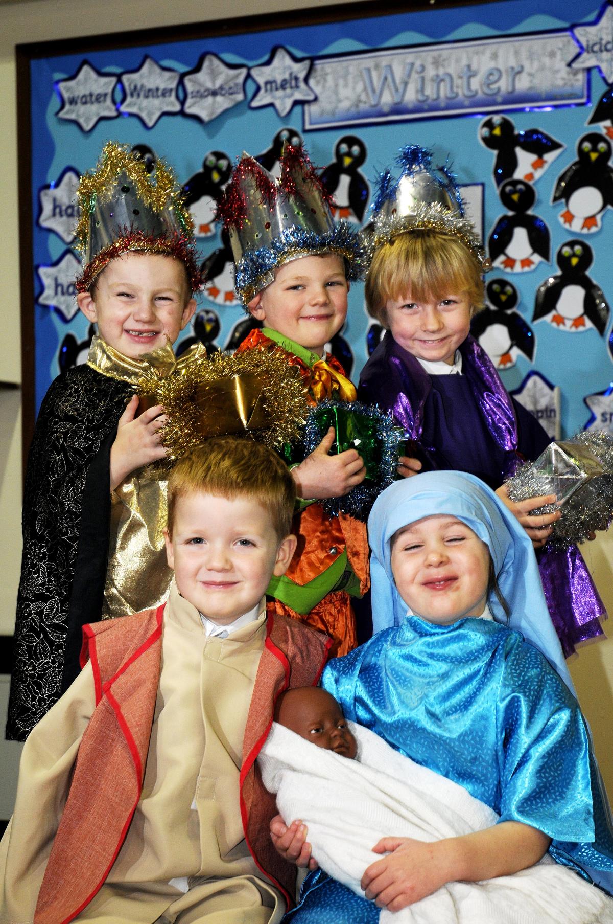 Front, Niamh Waterworth and Charlie Greenwood (Mary and Joseph), back, the Three Kings, from the left, Kieran Coleman, Hugo Beatham and Logan Tinkler