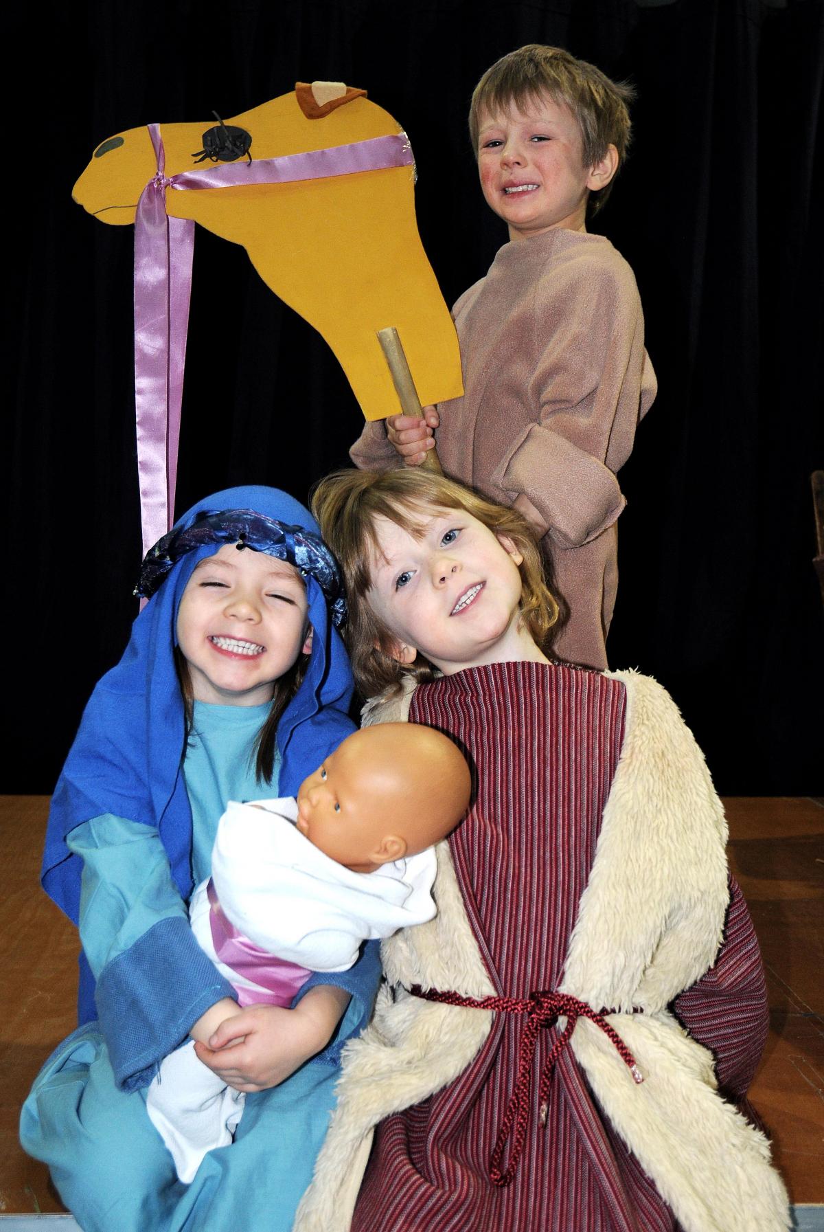 Appearing in Westville House School, Ilkley, Nativity 'Humph the Camel', were, back, Oliver Watson, front, Anna Joyce and Olivia Cann