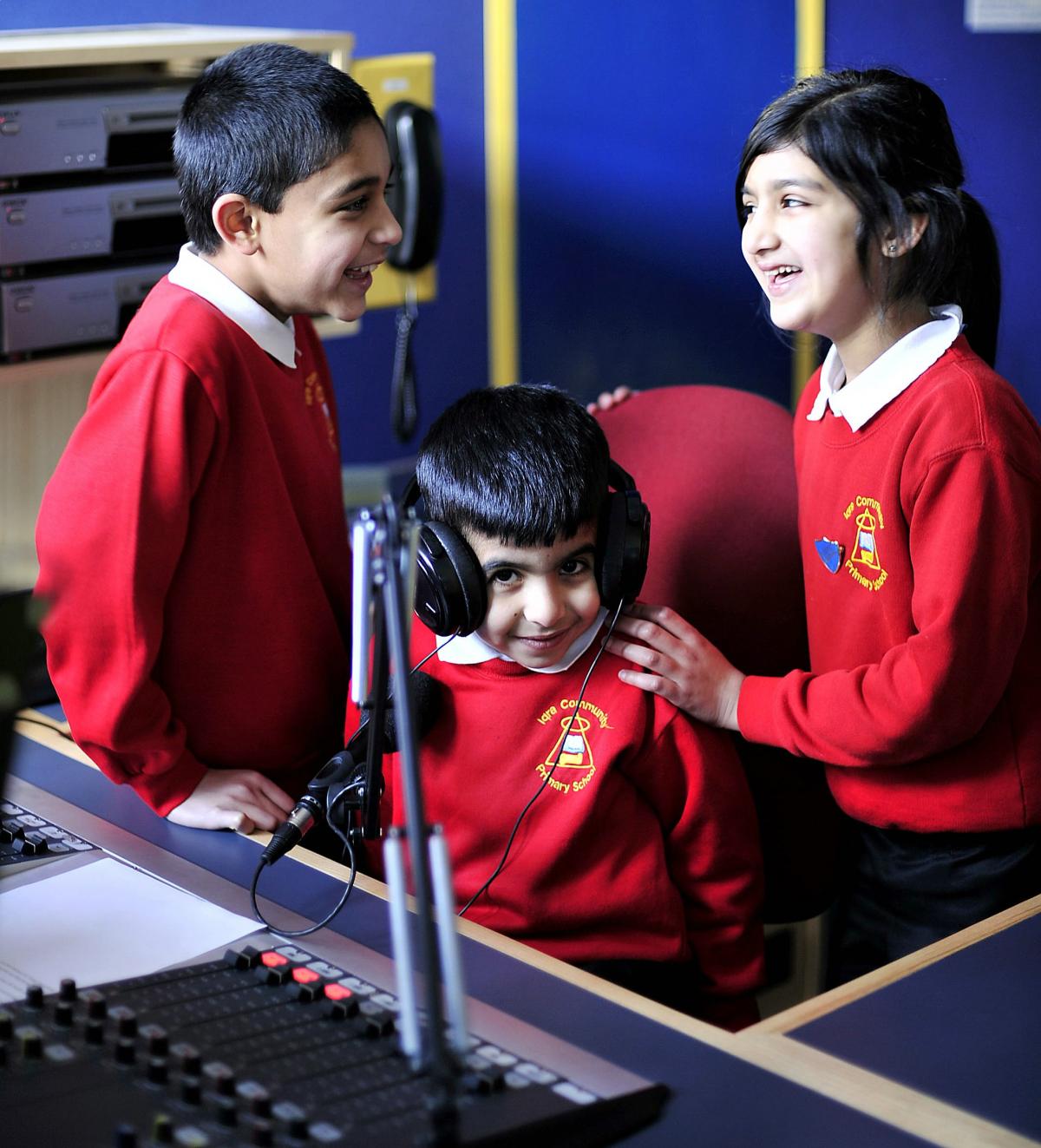 Children as young as four from Iqra Primary School heard their poems and stories over the airwaves. Pictured in the radio studio are Awais Hussain, Danish Ali and Samiya Amjad