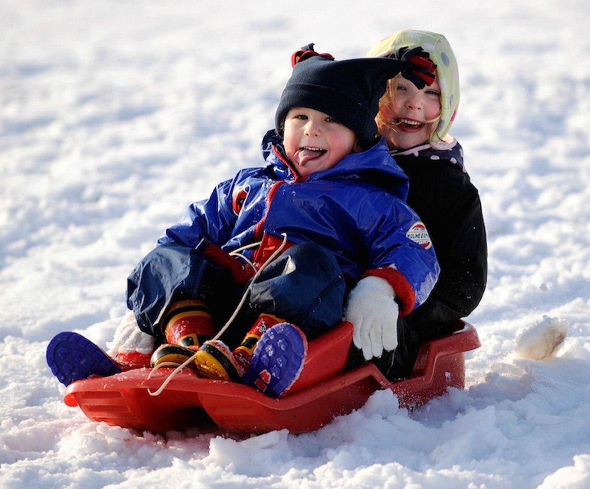 It was a case of slipping and a sliding for just about everybody as drivers endured treacherous roads on their way to work, and children had great fun on sledges as all the district’s schools closed for the day. These youngsters were enjoying sledging a