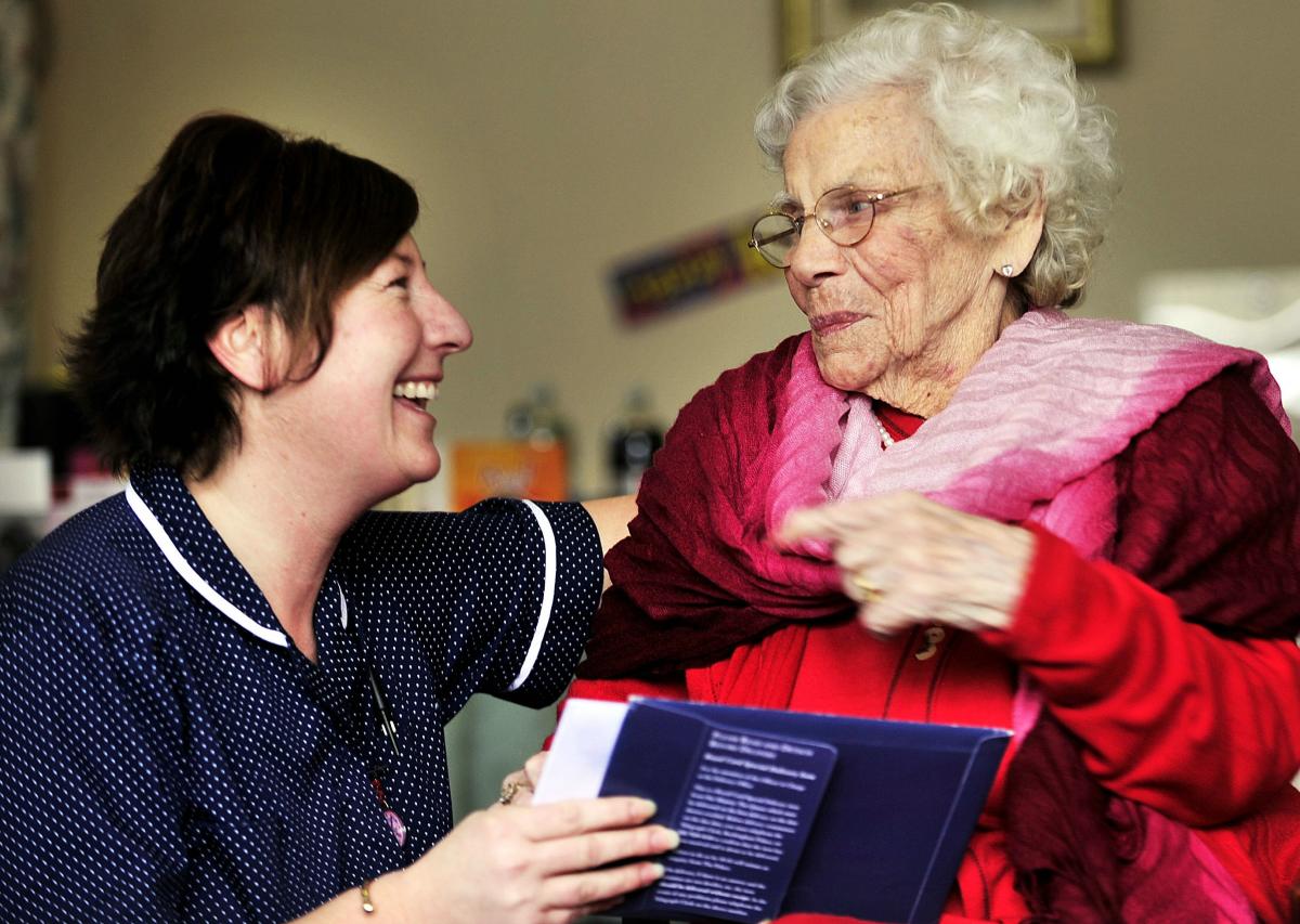 Bingley resident Amy Sharpe, pictured with nursing home manager Emma Rushen, celebrated her 100th birthday with  cake.