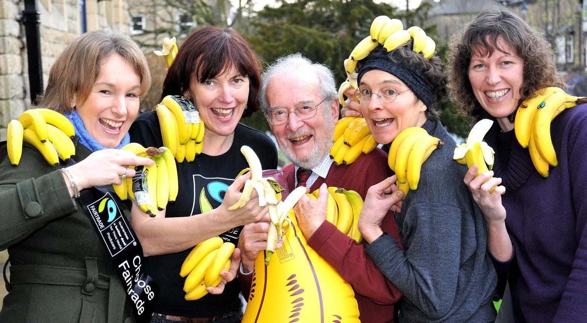 Ilkley Fairtrade Group is asking people to peel fairly-traded bananas on March 6 and 7 in a world record banana-eating attempt organised by the Fairtrade Foundation. Pictured, from the left, are Leander Hollings, director of My Small Shop, Stephanie Atkin