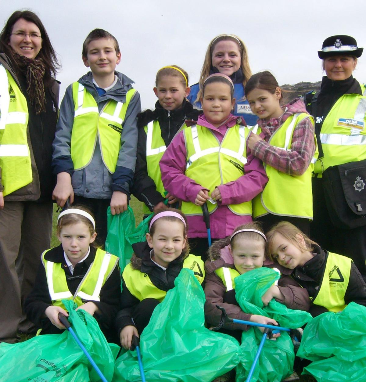 Community-spirited pupils at a Shipley primary school joined wardens in a purge on litter in their neighbourhood. 