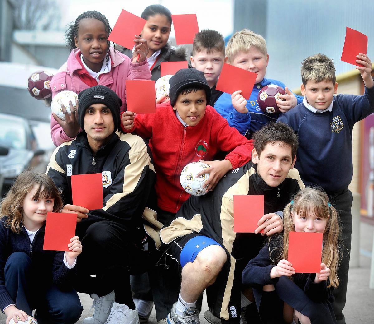 Bradford City footballers took time out from training to promote an anti-racism message to school children at Valley Parade. 