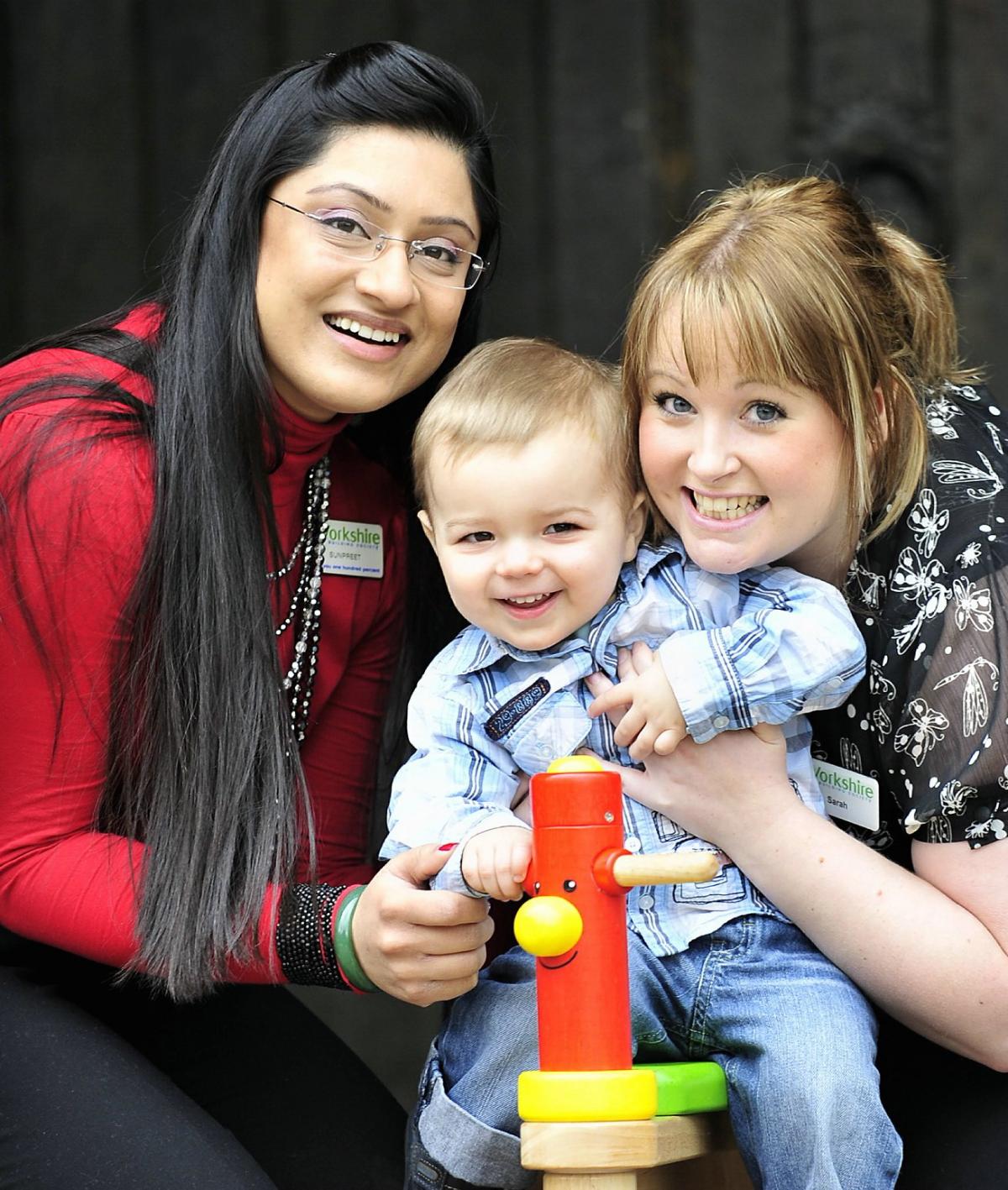 A donation from a Bradford-based building society has banked new toys for toddlers at a church nursery group. 
