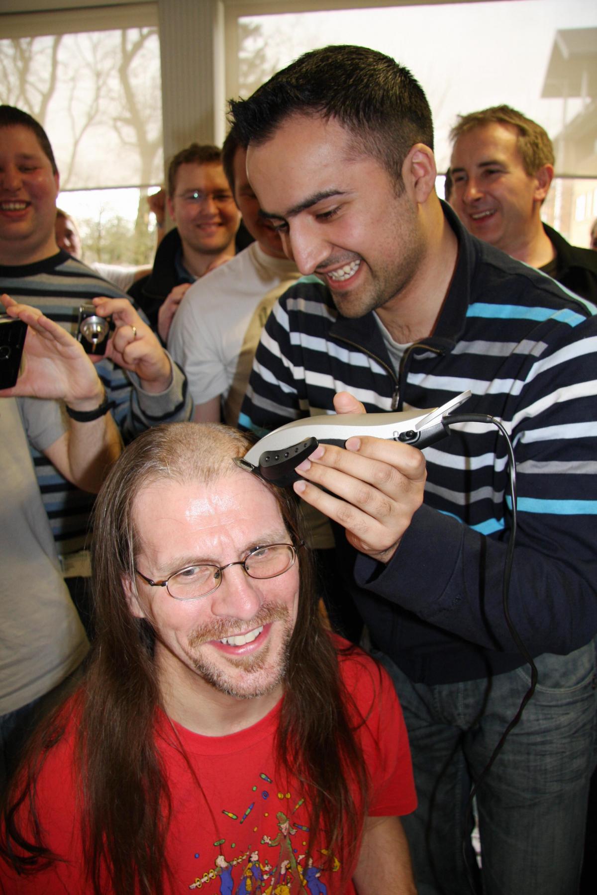 YBS staff member Paul Davies had his long locks shaved by Saheem Rashid for Red Nose Day.