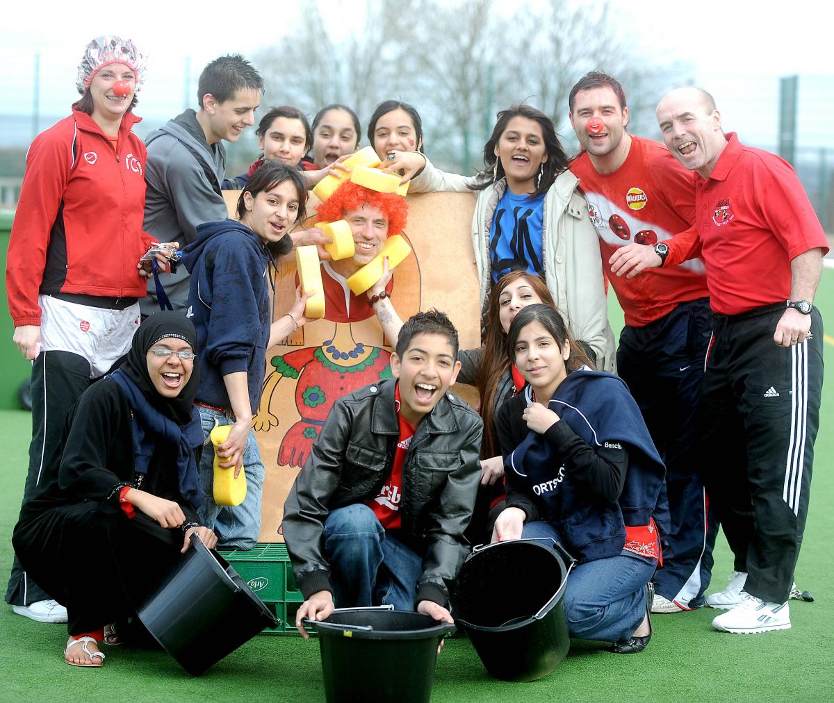 Pupils paid to throw wet sponges at their head teacher on Red Nose Day at Grange Academy.