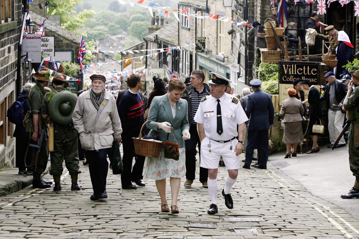 Visitors enjoy the atmosphere of the 1940s in Haworth Main Street.