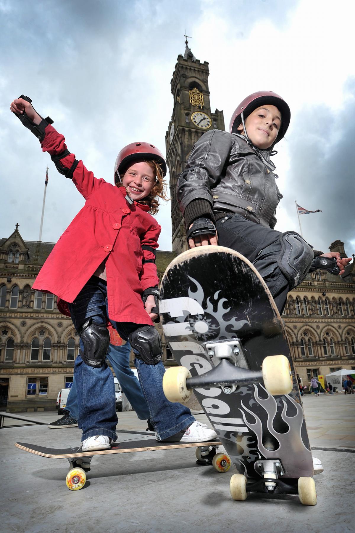 Abby Warden with friend Akenyia Maley on the skateboards at the Big City Play Day in Centenary Square, Bradford