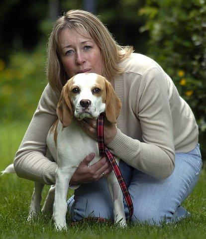 A dog owner has condemned the “cruel coward” who twice shot her pet with an air rifle. 


