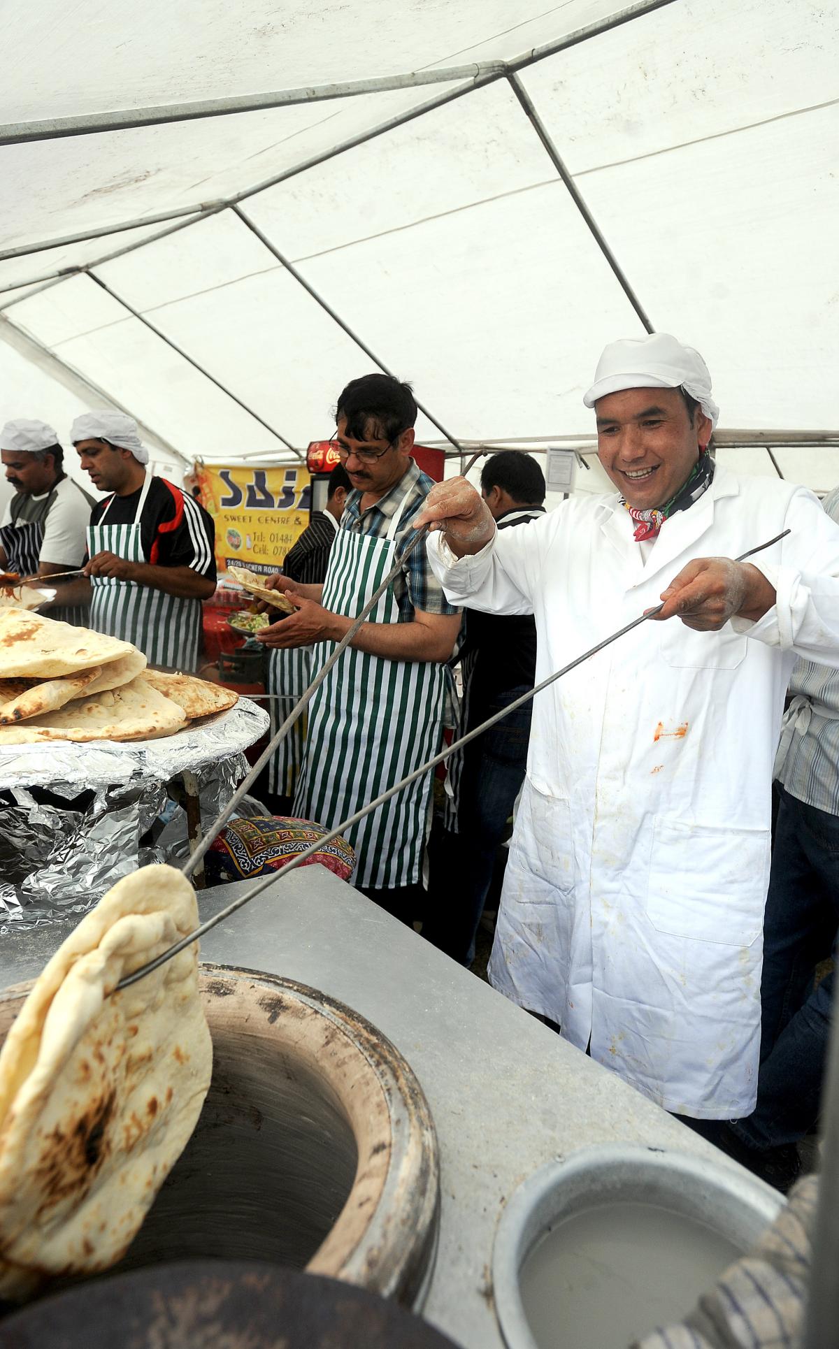 Rafiq Mohammed prepares naan bread
