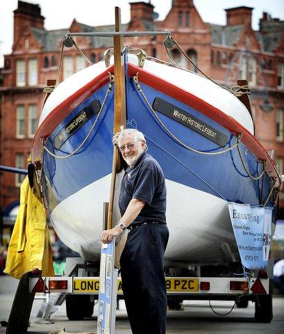 A recently restored 100-year-old lifeboat was on show in Centenary Square as part of a celebration flag day to mark 150 years of fundraising for lifeboats in the city. 


