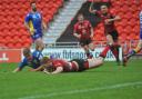 Mikey Wood goes over to score for Bulls against Doncaster   Pictures: Tom Pearson