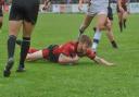 Joe Keyes slides in for one of his two tries