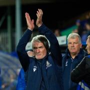 Mark Hughes claps the fans - but they were jeering him at the end