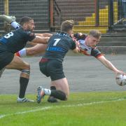 Ethan Ryan lives up to his Superman nickname to dive over for his second try against Skolars   Pictures: Tom Pearson