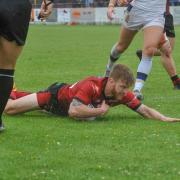 Joe Keyes slides in for one of his two tries