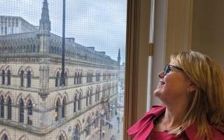 Kersten England, who is now chair of Bradford Culture Company, looks out to the Wool Exchange in Bradford City Centre
