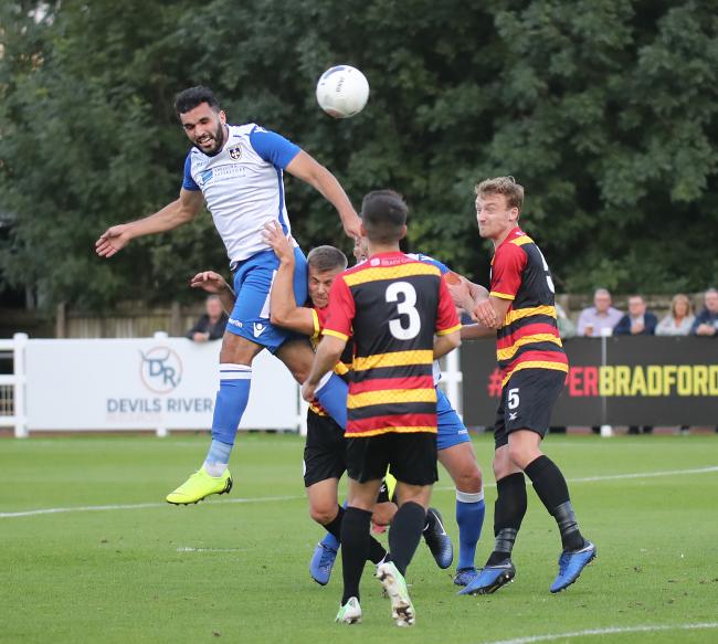 Guiseley’s Hamza Bencherif climbs above the Bradford (Park Avenue) defence in his side’s 5-0 victory in the Vanarama National League North at Horsfall Stadium on Tuesday night. Picture: Alex Daniel Photography 