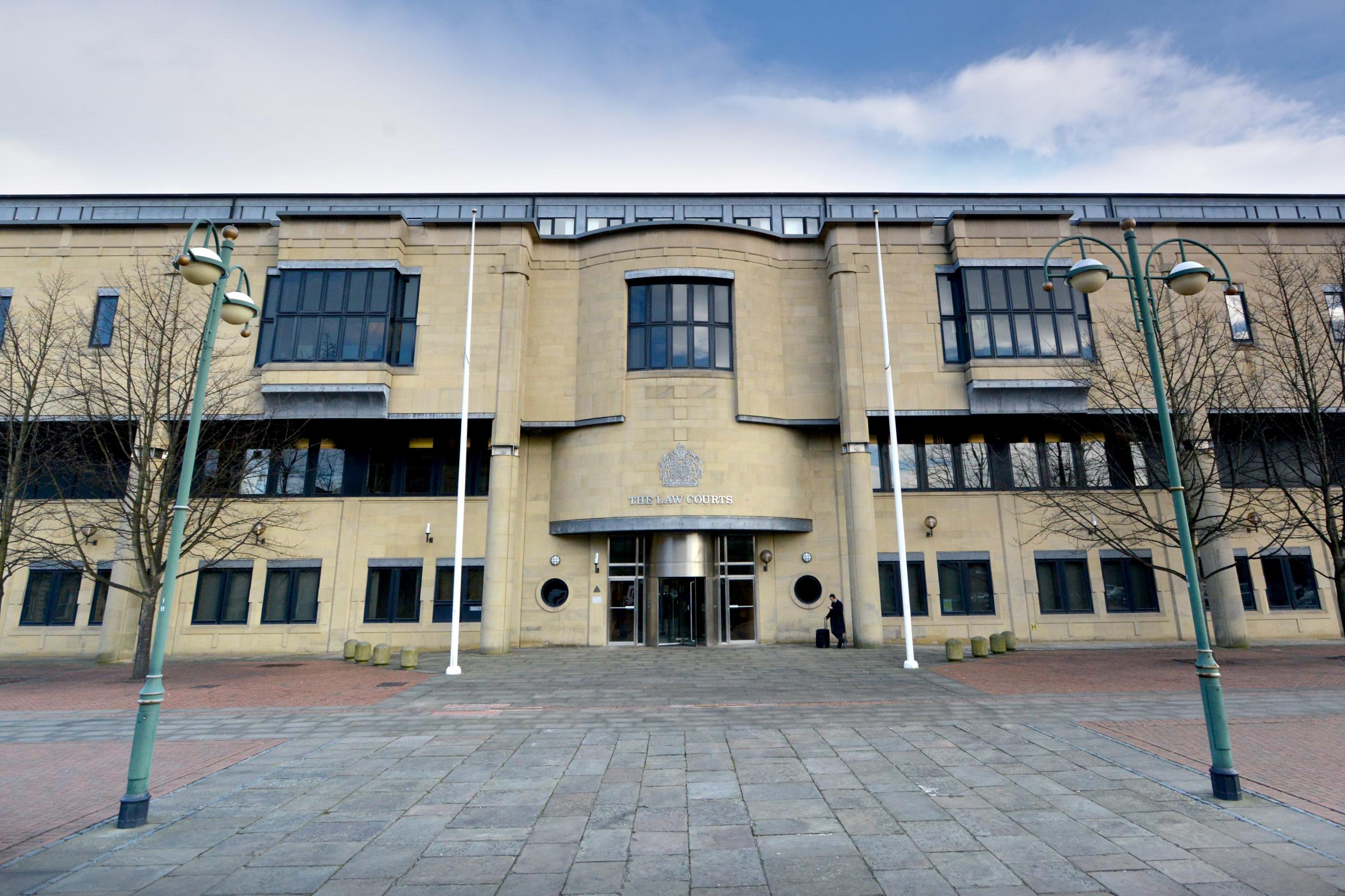 Burglar jailed after being caught red-handed at Bradford house