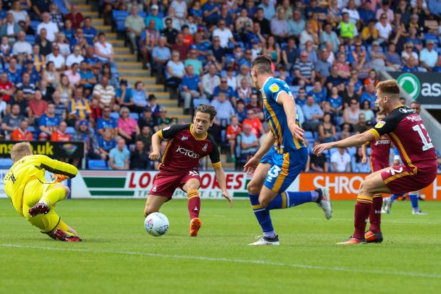 Bradford Telegraph and Argus: Jack Payne scores the winner for City at Shrewsbury in 2018. Picture: Thomas Gadd.