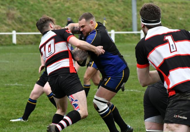 Skipper Christian Baines (blue and black) returned to action for Salem after a lengthy spell out with a knee injury. Picture: Richard Leach.