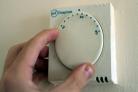 File photo dated 31/10/13 of a gas central heating thermostat. One in three British households fear living in a cold, draughty home will have an impact on their health, according to an energy charity..