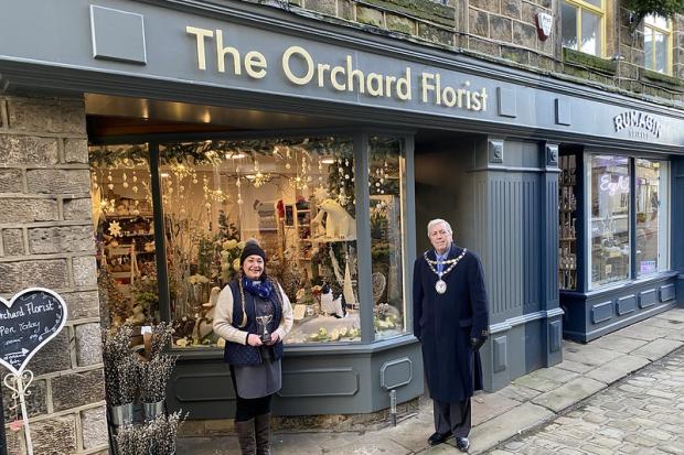 Otley Mayor Peter Jackson presenting the trophy to The Orchard Florist