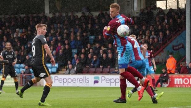 Bradford Telegraph and Argus: Eoin Doyle's last goal for City against Scunthorpe in April 2019. Picture: Thomas Gadd 