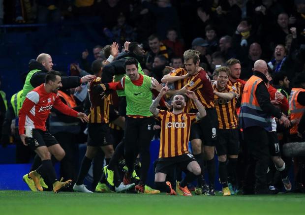 Bradford Telegraph and Argus: James Hanson in the midst of City's celebrations after shocking Chelsea