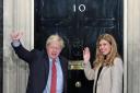 Prime Minister Boris Johnson and his girlfriend Carrie Symonds arrive in Downing Street. Picture: Yui Mok/PA Wire