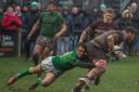 A Wharfedale player flies in to tackle a Huddersfield ball carrier. Picture: Ro Burridge