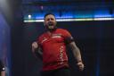 Joe Cullen was left roaring with delight after edging a thriller against Jonny Clayton Picture: Lawrence Lustig/PDC