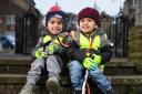 Boys Kaidan Khan, aged four (left) and his brother, Mikaeel, two, are set to carry out weekly litter picks around Bradford district parks and streets