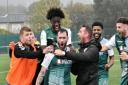 Jordan Townend is mobbed after his last-gasp goal secured a point for Steeton on Saturday. Picture: Ian Meachin.
