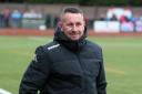 Guiseley have appointed former Matlock manager Paul Phillips.