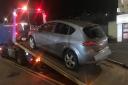 This car was seized by police after reportedly running a red light