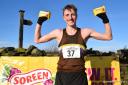 Nathan Lawson poses with his malt loaves after a comprehensive victory at the Stanbury Splash fell race. Picture: Dave Woodhead/WoodenTops.