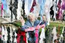 Gargrave WI member Christine Baldwin shows of the hundreds of bras collected for  a charity to raise money for Yorkshire Air Ambulance. 2007