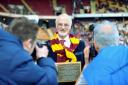 Professor David Sharpe pictured receiving a plaque from Bradford City in 2014