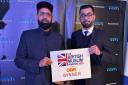 Project Director Muhammad Afzal Saeedi (left) and Huzaifa al-Yamani holding their gong at The British Muslim Awards 2023