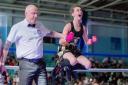 Neveah-Mai Brierley celebrating after winning a British title